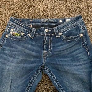 Camo sequin Miss Me bootcut jeans